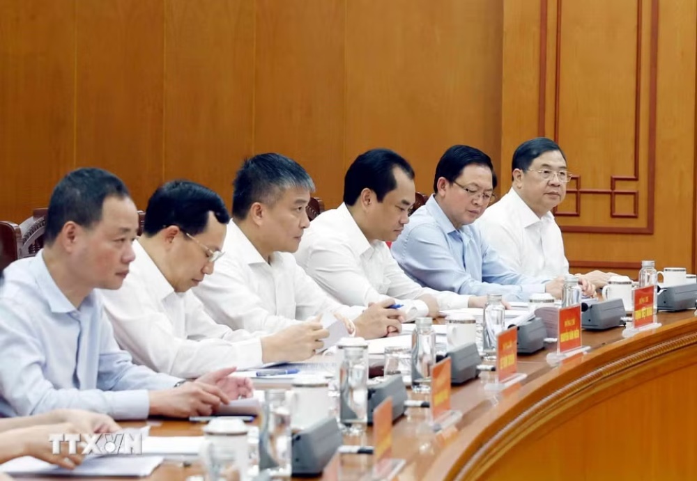 Các lãnh đạo và các đại biểu dự cuộc làm việc. Ảnh: TTXVN
