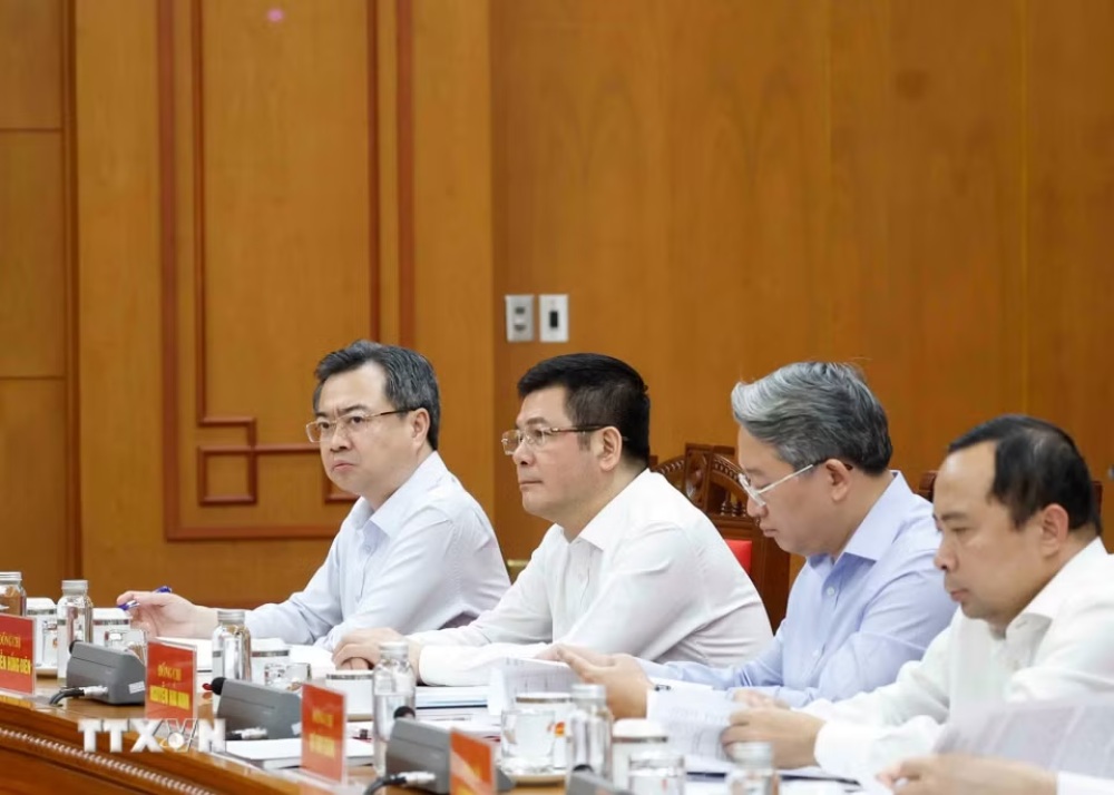 Các lãnh đạo và các đại biểu dự cuộc làm việc. Ảnh: TTXVN