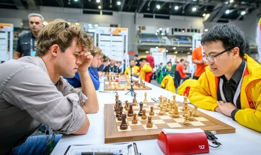 Le Quang Liem and Magnus Carlsen once met at the 2024 Olympics but continue to face each other at the ASEAN Esports Cup 2026. Photo: FIDE