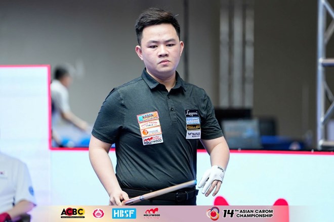 Jugador Bao Phuong Vinh del billar de Vietnam. Foto de : Phong Le