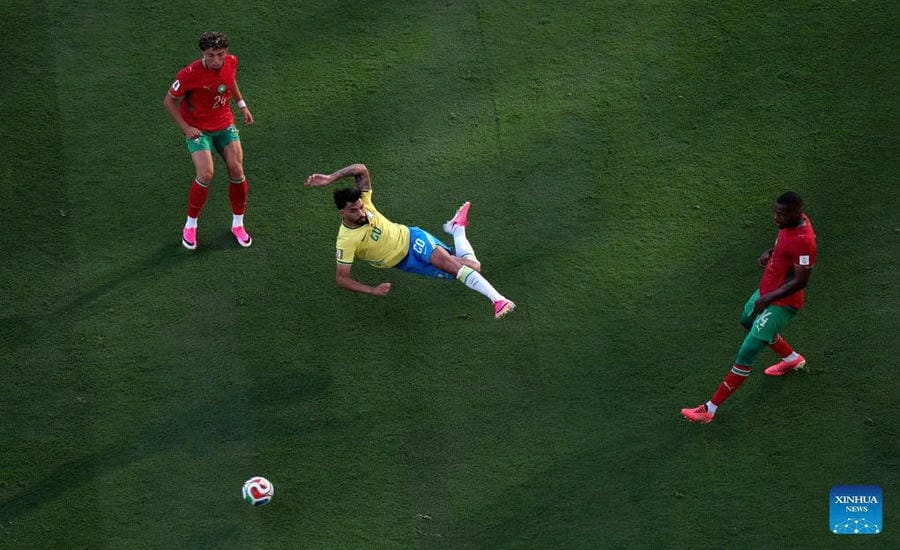 Players wear pink shoes in the Brazil - Morocco match at the 2026 World Cup. Photo: Xinhua