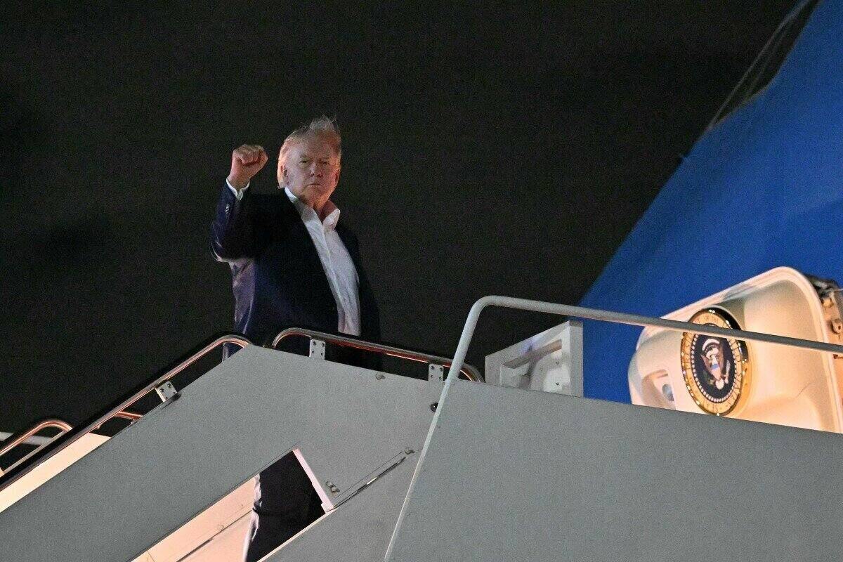 US President Donald Trump boards a plane to France to attend the G7 summit. Photo: AFP