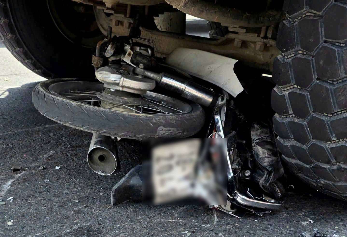 Scene of the accident between a motorbike and a truck that killed the man. Photo: Reader provided