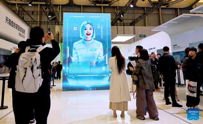 A virtual flight attendant at the "AI for All" international exhibition in Shanghai, China in 2025. Photo: Xinhua