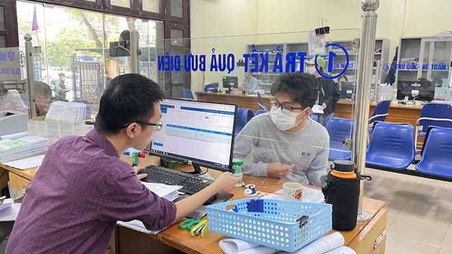 Ho Chi Minh City Social Insurance proposes to definitively handle the delay in issuing health insurance cards. Photo: Ha Anh
