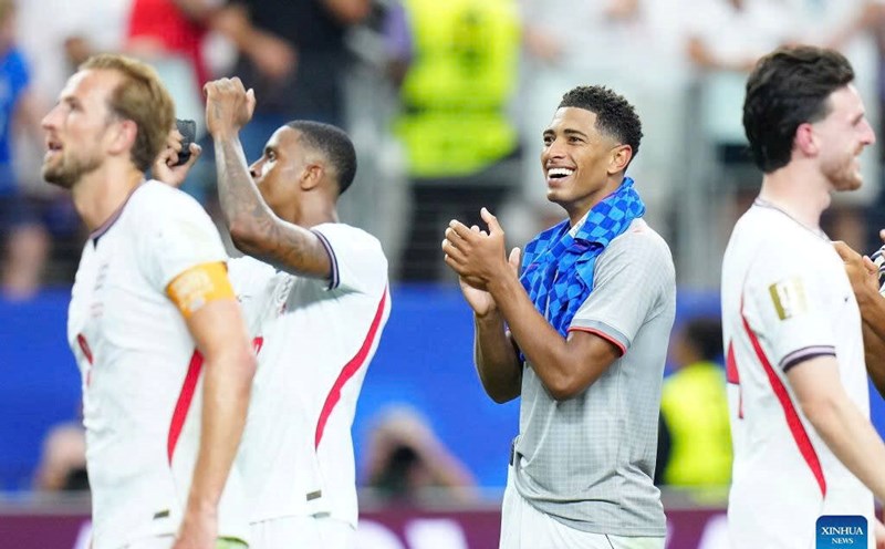The England team had a successful opening match. Photo: Xinhua