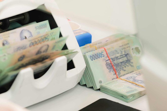 Người làm lái xe theo Nghị định 111 được xếp lương hệ số hay trả lương thỏa thuận là vấn đề được bạn đọc quan tâm. Ảnh: Hải Nguyễn
