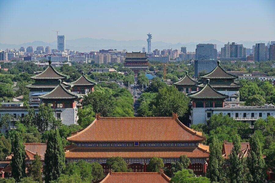 China announces new regulations to tighten control over overseas deals. Photo: Xinhua