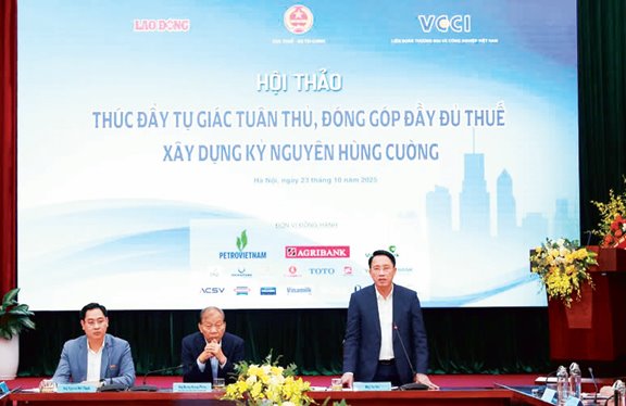 Lao Dong Newspaper organizes a seminar on Taxation. Photo BY DINH HAI