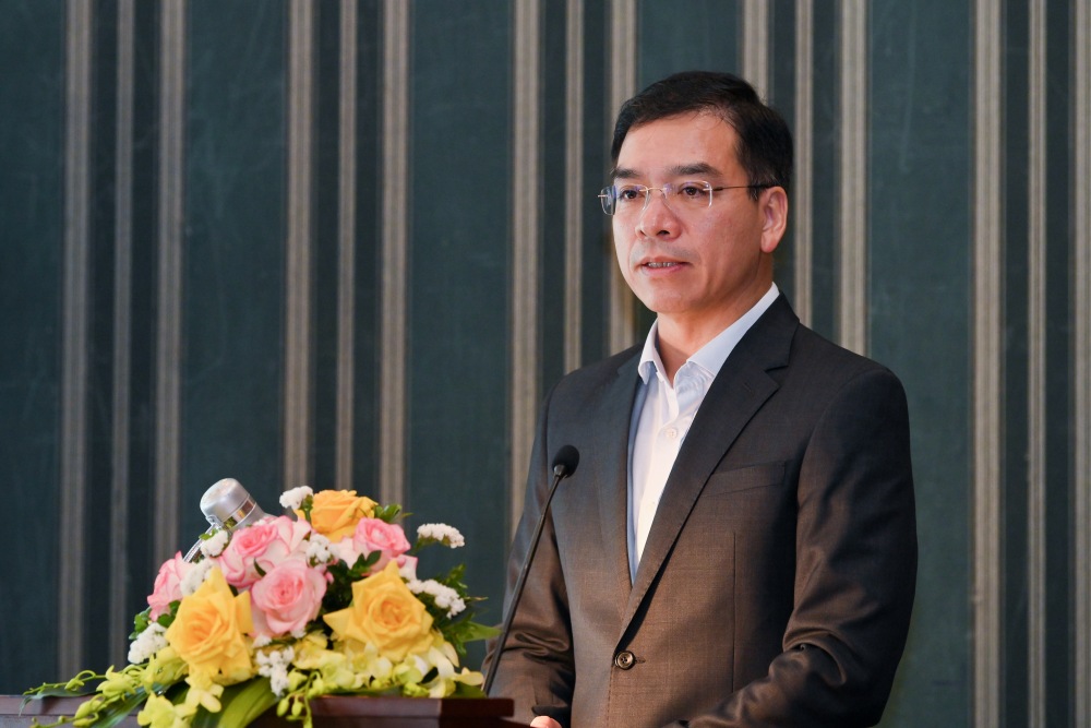 Dr. Ha Anh Duc - Director of the Department of Medical Examination and Treatment Management, Ministry of Health speaking at the workshop. Photo: Quang Dai