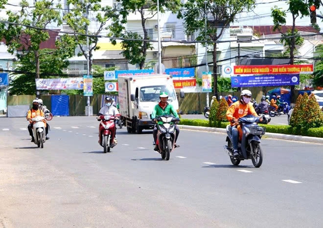 The Ministry of Home Affairs has explained that it has not added shippers and technology drivers to the compulsory insurance coverage category. Photo: My Ly