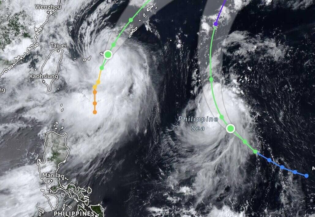 Typhoon Mekkhala (left) and Typhoon Higos. Photo: Zoom Earth