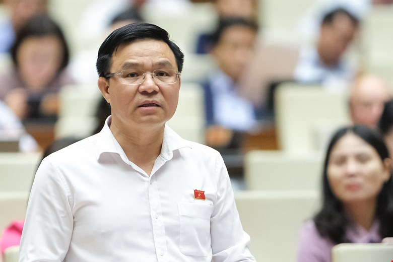 Member of the Party Central Committee, Minister of Industry and Trade Le Manh Hung receives a new task. Photo: Pham Dong