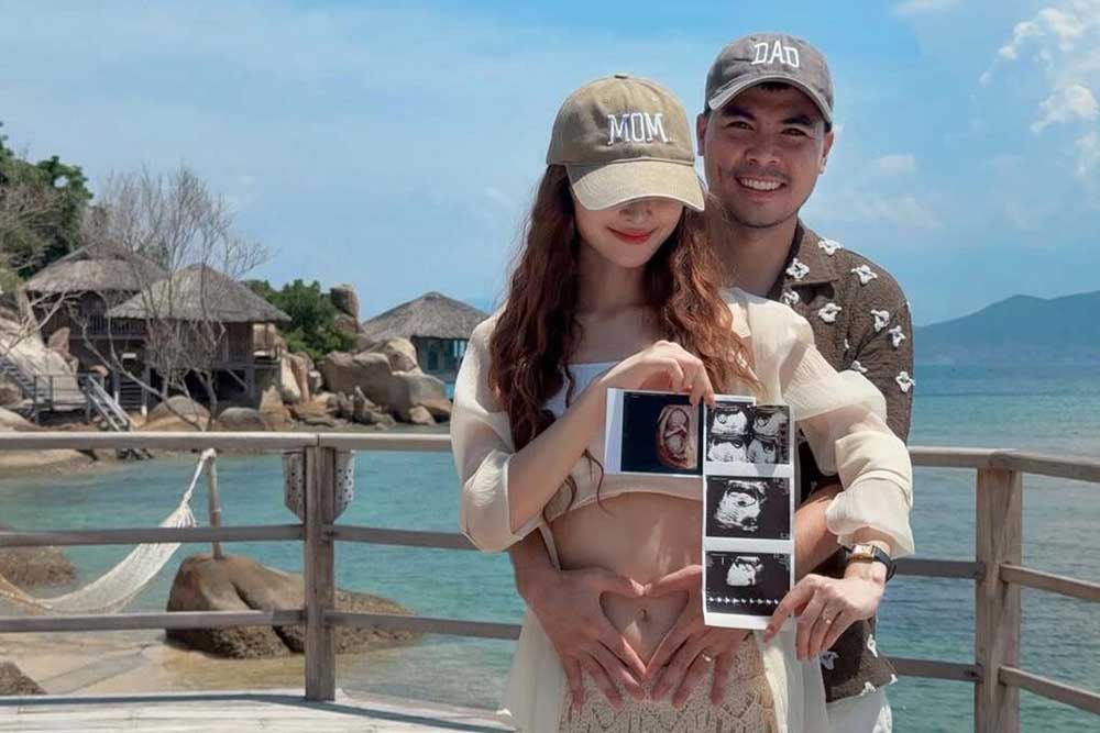 Duc Huy and Huyen Trang share the joy of preparing to welcome a new family member. Photo: Ho Chi Minh City Police Club