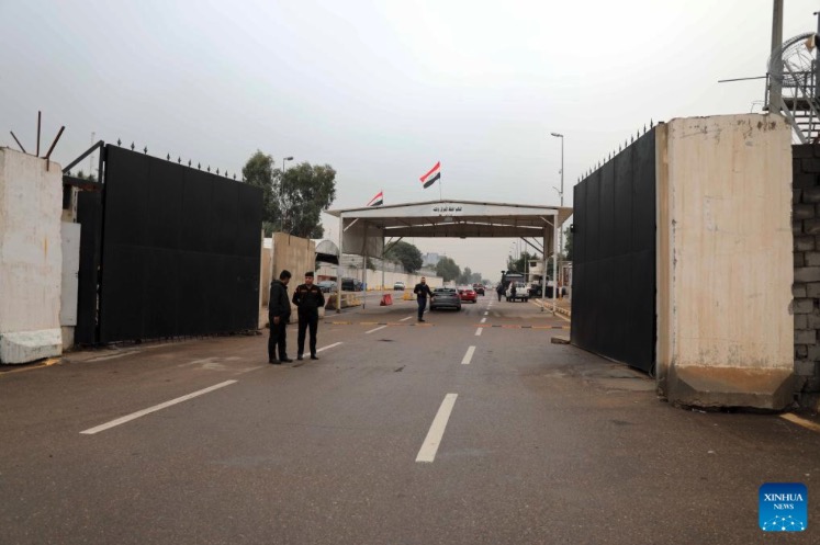 Security forces guard one of the entrances to the Green Zone in Baghdad, Iraq. Photo: Xinhua