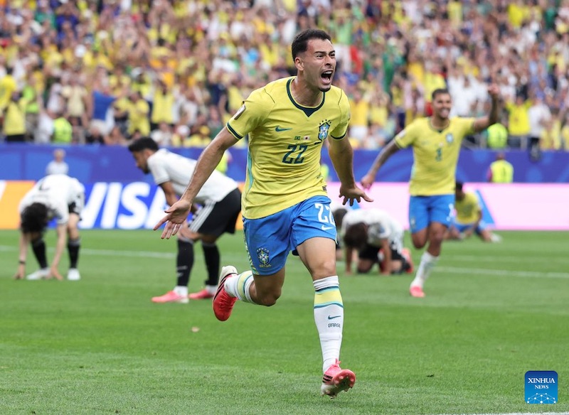  Tuyển Brazil giành chiến thắng 2-1 trước Nhật Bản để giành quyền vào vòng 16 đội. Ảnh: Xinhua