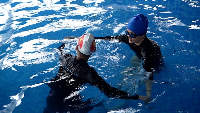 Adults learn to swim, raise their own safety shield