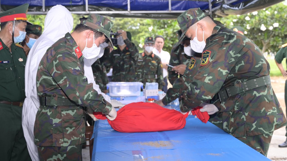 Taking samples for 37 unidentified martyrs' graves at Chau Phu Martyrs' Cemetery. Photo: Phuong Vu