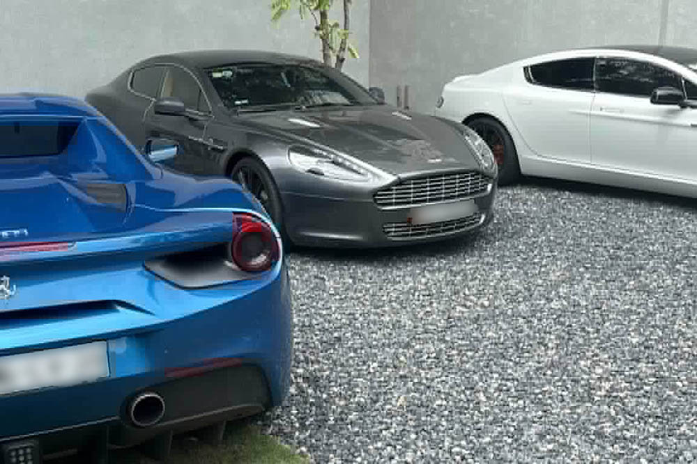 Ferrari 488 Spider appears with two Aston Martin Rapide in Ho Chi Minh City. Photo: Trieu Hoang