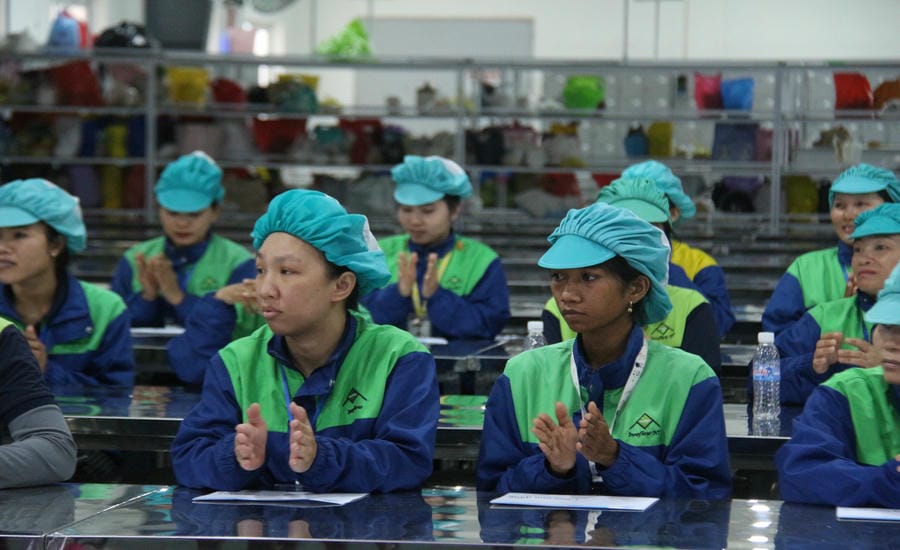 Union members and employees of Innoflow NT Co., Ltd. Branch are excited about the new policies approved at the 14th Vietnam Trade Union Congress. Photo: Phuong Linh