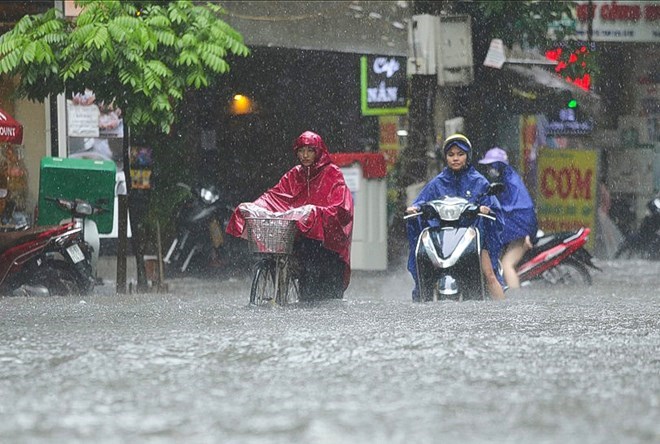 Không khí lạnh tràn xuống miền Bắc gây mưa to trên diện rộng. Ảnh: Tô Thế