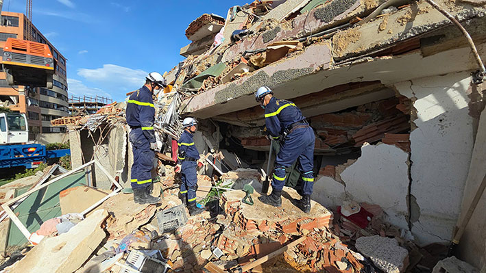 The Vietnamese Police rescue and relief team approaches the scene where 15 people were identified as trapped. Photo: Ministry of Public Security