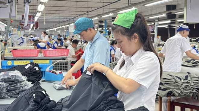 Chuỗi hoạt động kỷ niệm 97 năm Ngày thành lập Công đoàn Việt Nam tập trung chăm lo, động viên người lao động. Ảnh: Hoàng Lộc