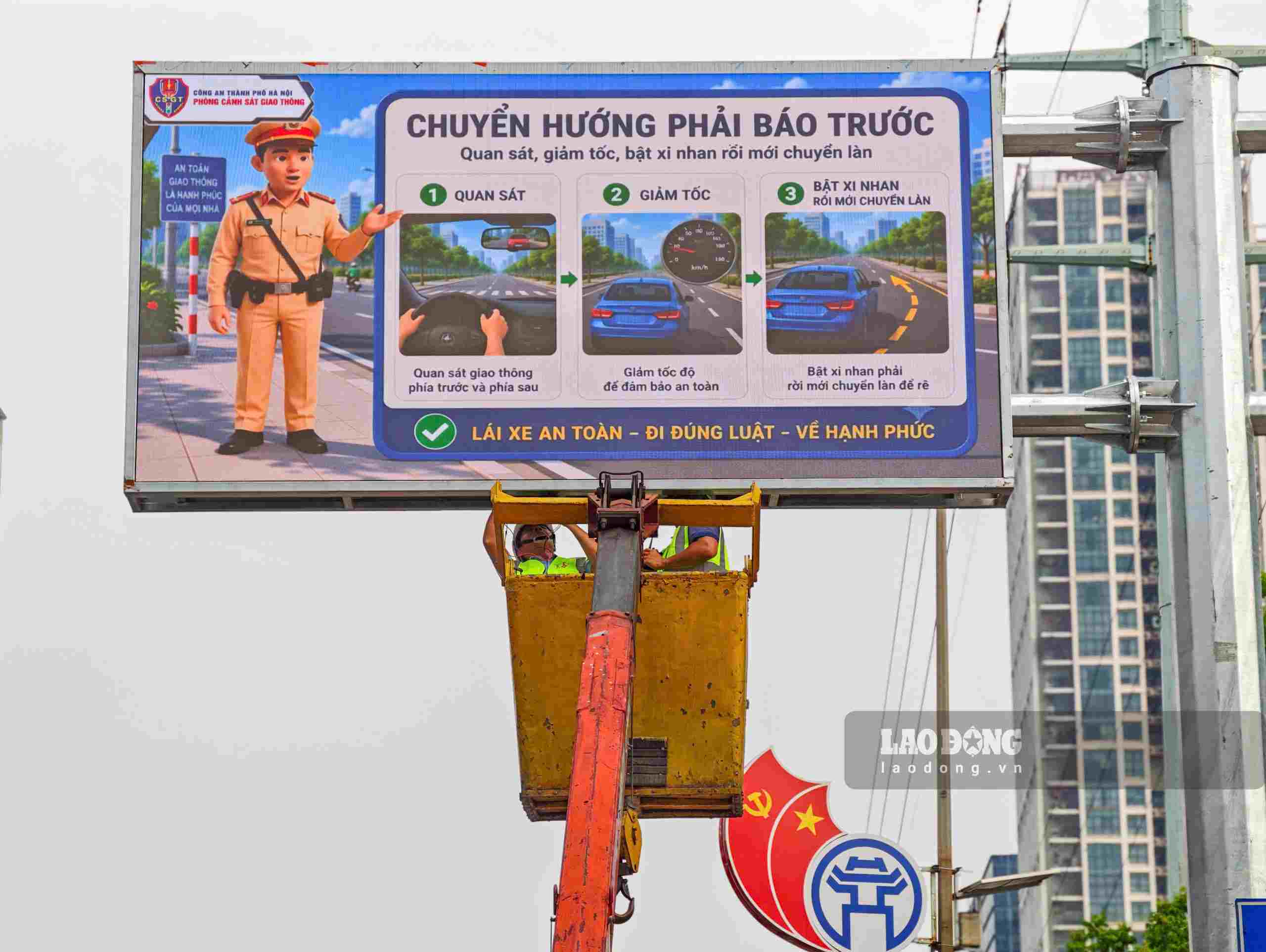 Close-up of congestion and accident warning devices being installed on Hanoi streets