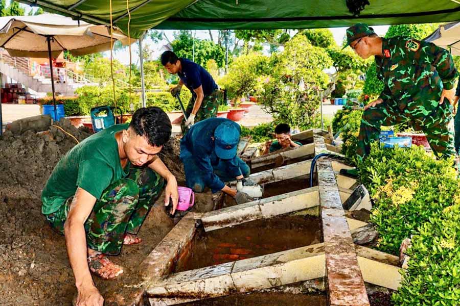 Các lực lượng làm nhiệm vụ tại Nghĩa trang Liệt sĩ Lai Vung - Lấp Vò (Đồng Tháp). Ảnh: Cổng TTĐT tỉnh Đồng Tháp