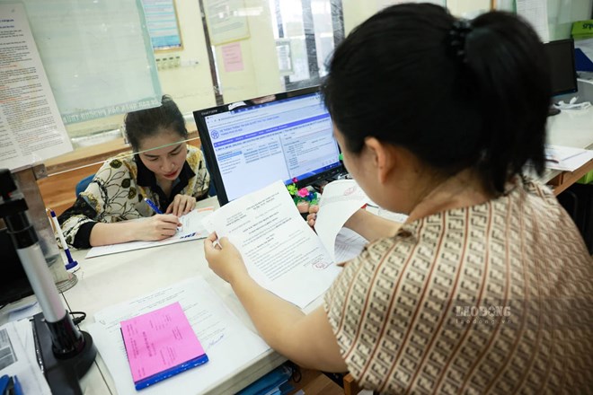 The time of income payment is the basis for applying the PIT deduction rate at a rate of 10%. Photo: Hai Nguyen