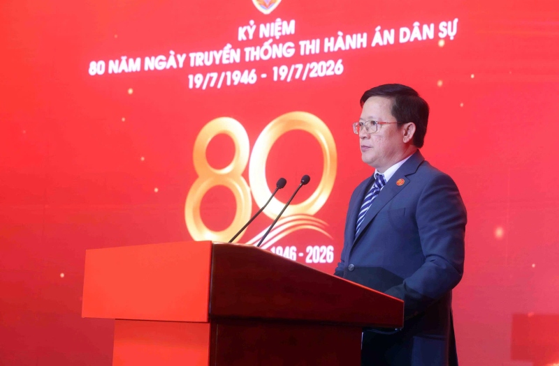 Thứ trưởng Bộ Tư pháp Mai Lương Khôi trình bày Diễn văn kỷ niệm 80 năm Ngày truyền thống THADS. Ảnh: Cục Quản lý THADS