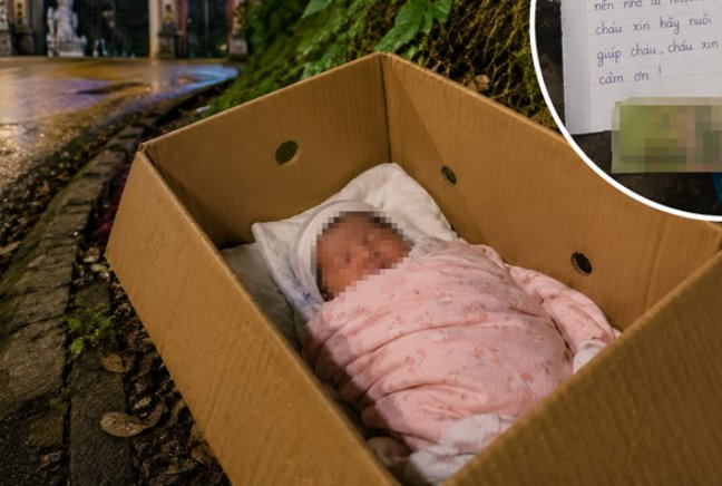 People discovered a newborn baby girl abandoned on the way to the pagoda. Graphic photo: Dinh Dai