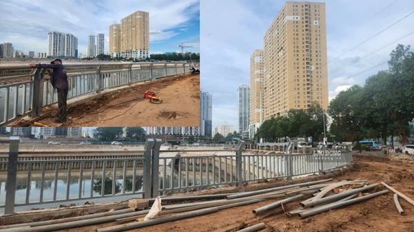 Những mét lan can cuối cùng đang được hoàn thiện. Ảnh: Minh Hạnh 