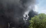 Black smoke billowing from the garbage dump fire in Quang Tri. Photo: Nam Trach Commune People's Committee