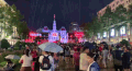 Ho Chi Minh City center is bustling before the fireworks display to celebrate the 50th anniversary of the city named after Uncle Ho
