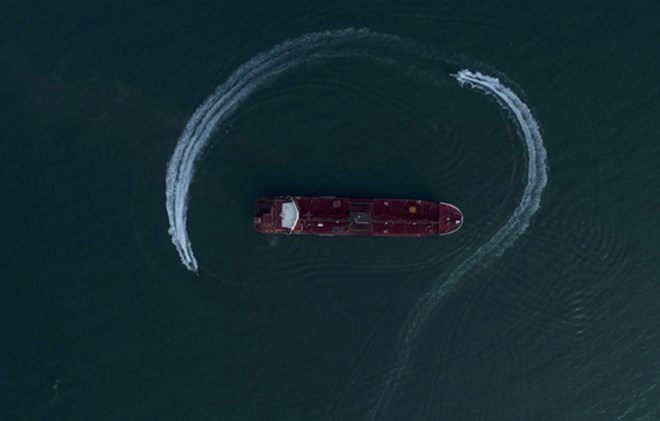 On July 20, a ship was found burning by British authorities in the Strait of Hormuz. Photo: A cargo ship operating in the Strait of Hormuz. Source: Xinhua
