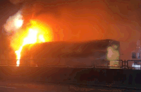 Passenger car fire on National Highway 1 in Dong Nai City, many casualties. Photo: Reader provided
