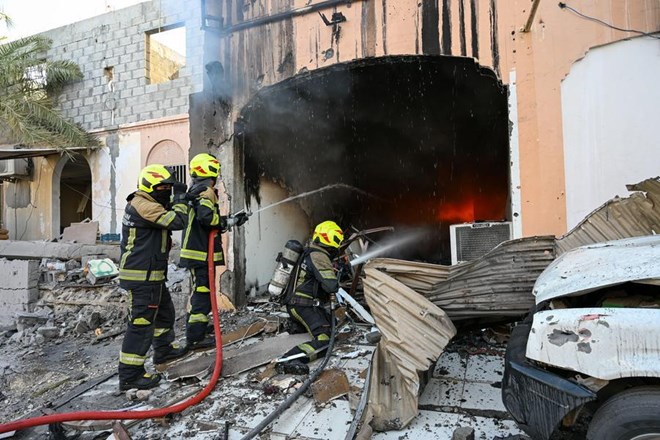 Bahrain Civil Defense forces extinguish a fire caused by debris from intercepted Iranian UAVs falling in Hamad town, Bahrain, June 11, 2026. Photo: Xinhua