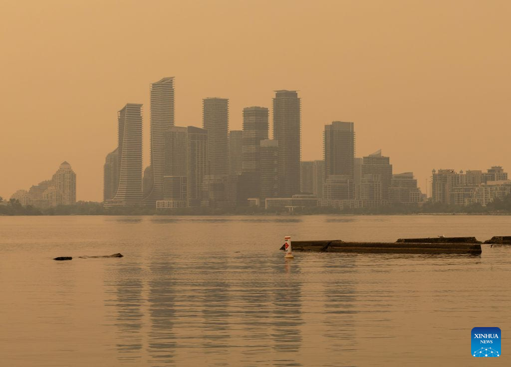 Smoke from forest fires in northwestern Ontario covering the sky of Toronto, Canada, July 15, 2026. Photo: Xinhua