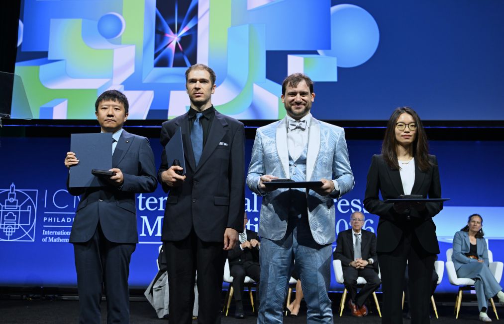 4 mathematicians awarded the 2026 Fields Prize. Photo: Xinhua