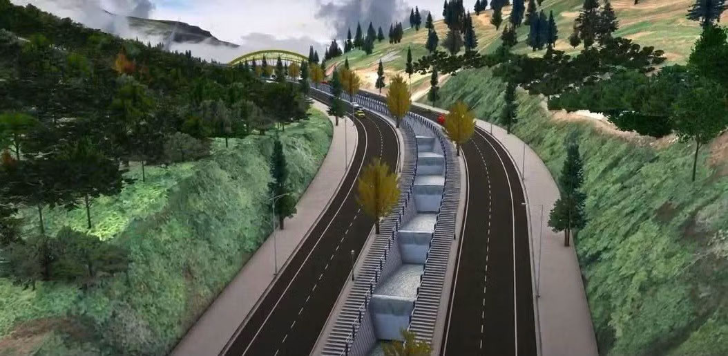 Perspective of the access road to the tunnel with a scale of 4 car lanes with a landscape system and pedestrian walkways. Photo: Lao Cai e-Portal