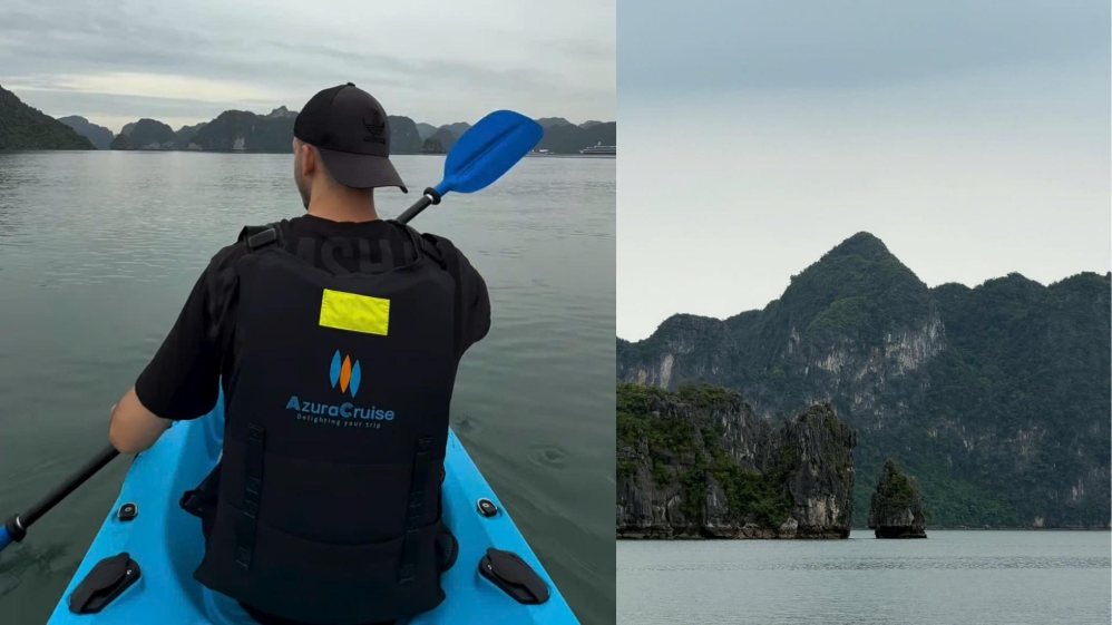 Hai du khách trải nghiệm chèo kayak giữa khung cảnh kỳ vĩ của vịnh Hạ Long trong hành trình khám phá miền Bắc Việt Nam. Ảnh: Nhân vật cung cấp