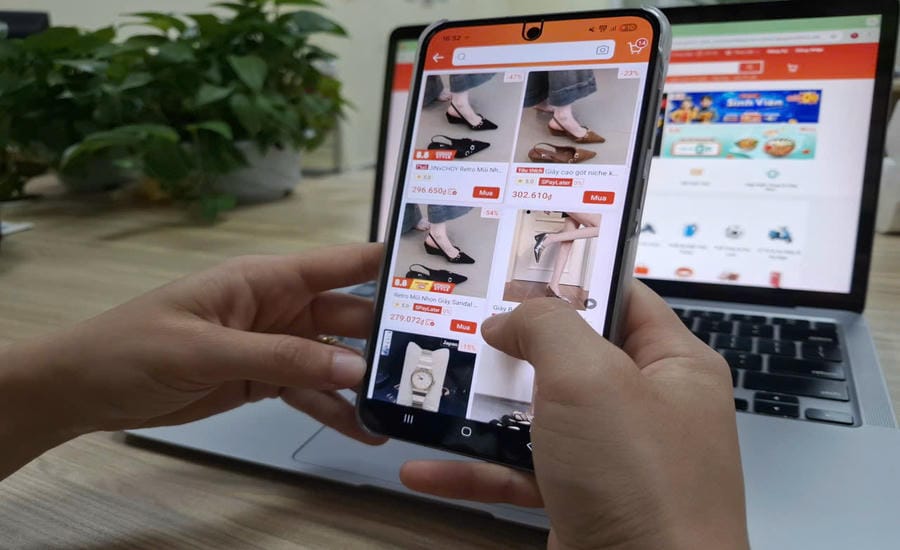 Many businesses selling goods on online platforms are still concerned about implementing tax regulations. Photo: Luc Giang