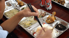 Workers in Da Nang are surprised when their usual shift meal trays are upgraded to be nutritious. Photo: Thanh Huyen