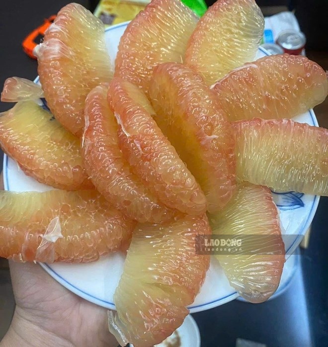 아침 식사 후 신선한 자몽 주스를 약 150-200ml 마시면 간 기능 향상에 도움이 됩니다. 사진: Quang Minh.