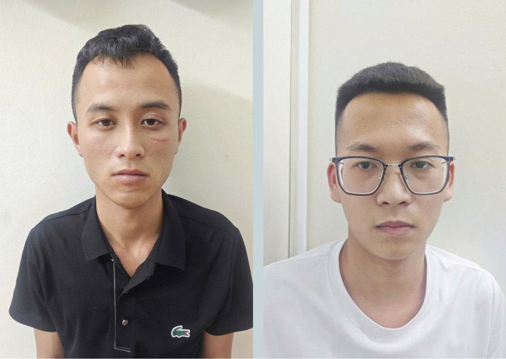 Nguyễn Vũ Kỳ (áo đen) và Hoàng Tuấn Nhật bị khởi tố về hành vi lừa đảo chiếm đoạt tài sản. Ảnh: Công an Hà Tĩnh
