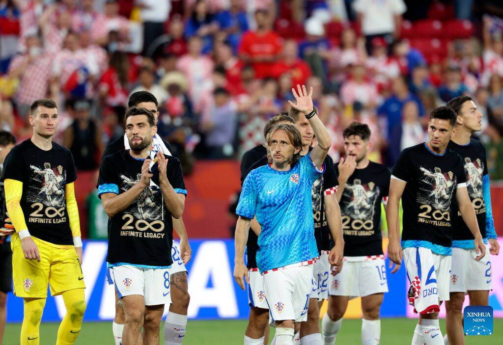Luka Modric và các đồng đội dừng bước ở vòng 1/16. Ảnh: Xinhua