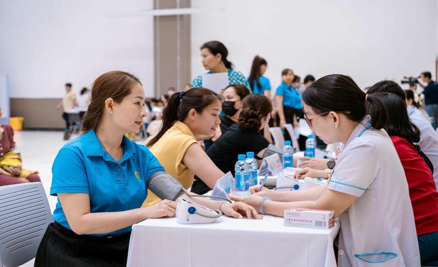 Workers are given free health check-ups organized by the Ho Chi Minh City Labor Federation in coordination. Photo: Duc Long