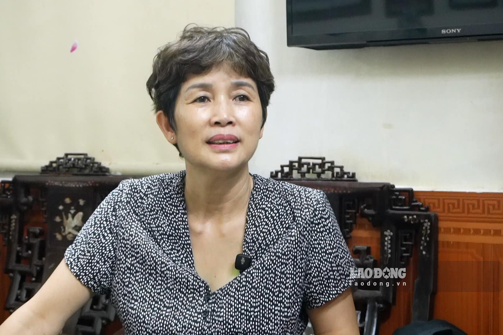 Theo chị Lưu Thị Phan Oanh, việc bỏ giới hạn 12 tháng sẽ tạo thuận lợi hơn cho người hưởng lương hưu và gia đình. Ảnh: Trang Anh