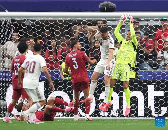 Ruben Dias argues with Quaresma after Portugal's defeat at the 2026 World Cup. Photo: Xinhua